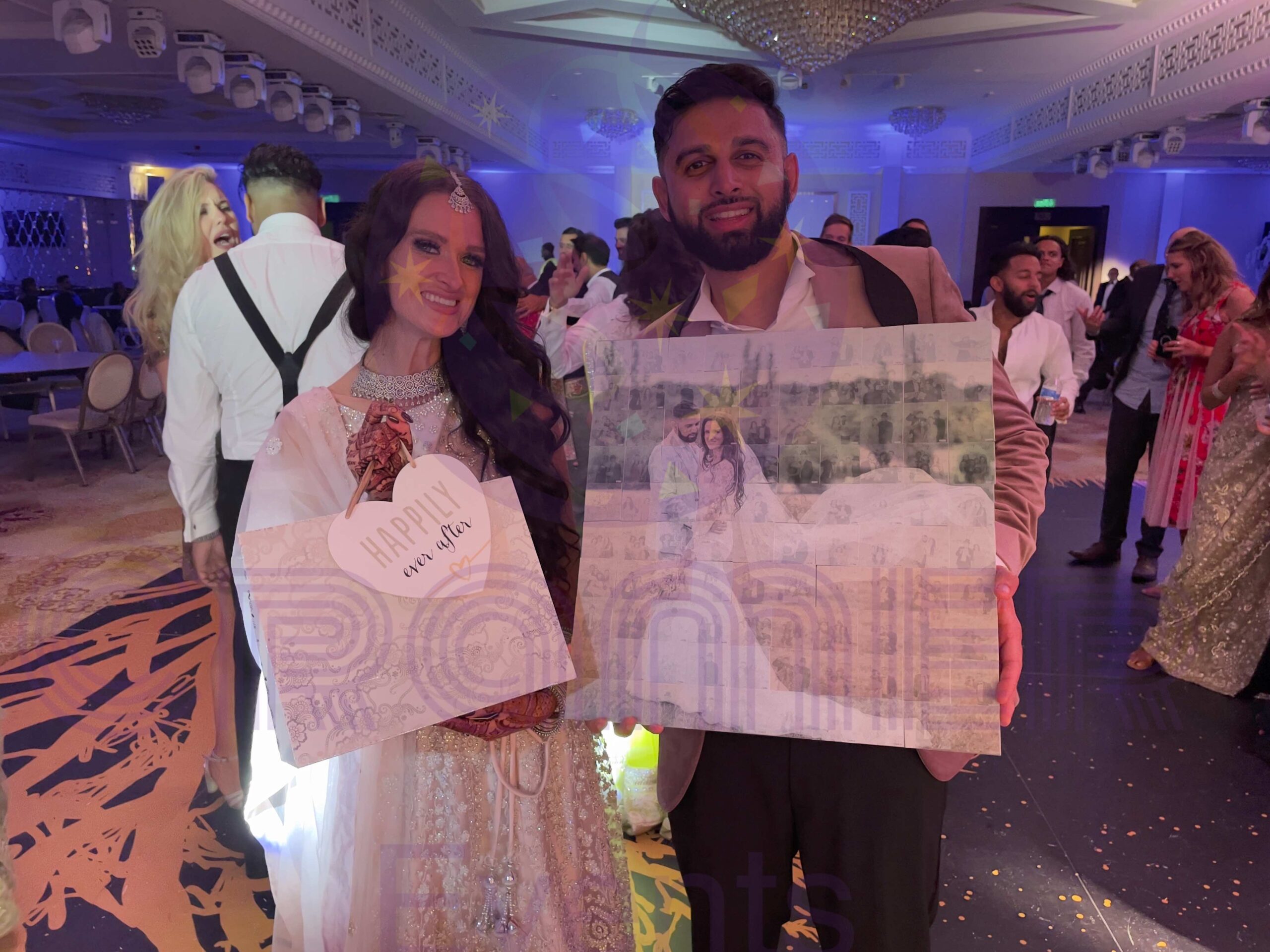 Cramer Events Photo Mosaic experience at the Grand Palladium in Croydon London, bride ands groom holding their post wedding mosaic board