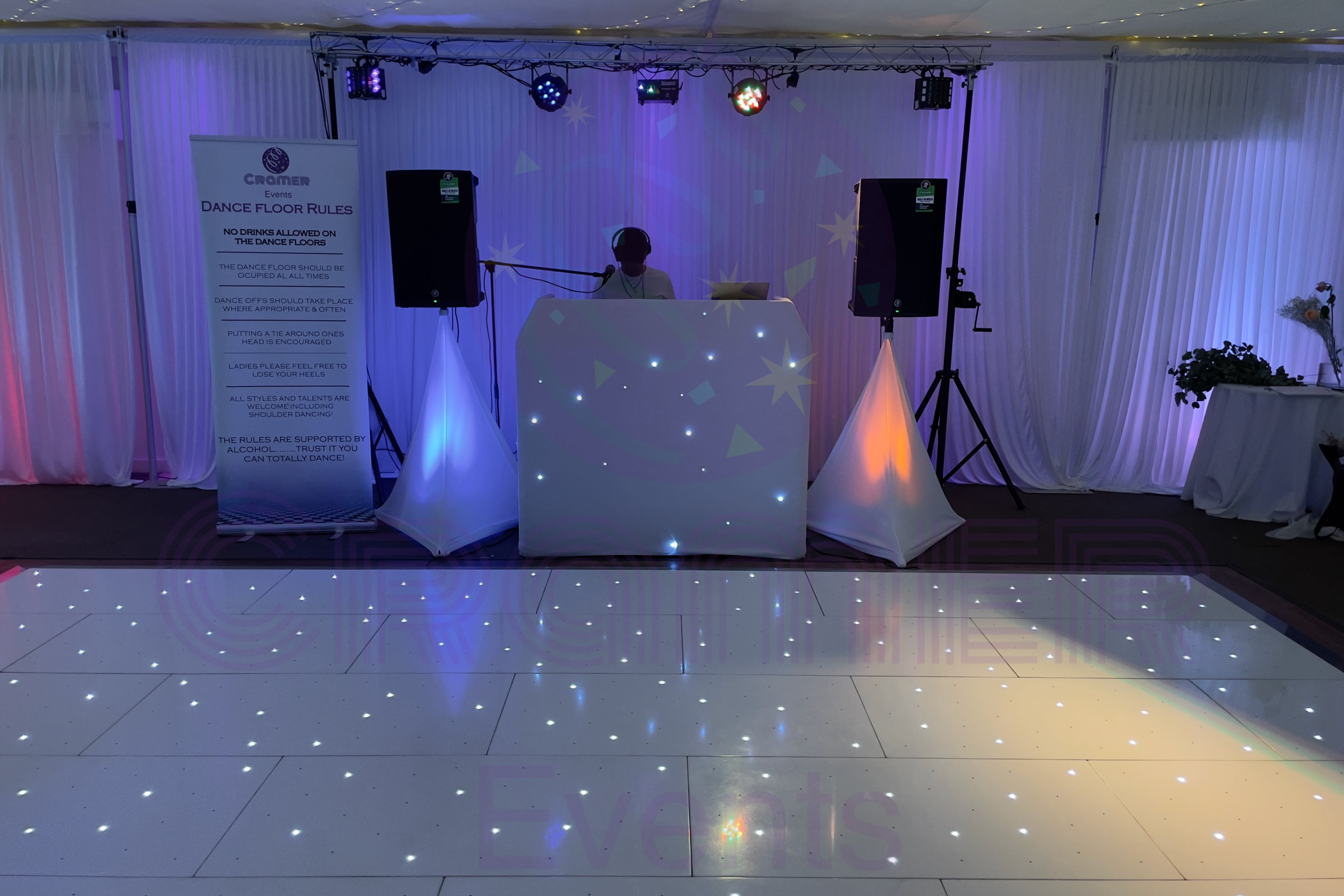 Cramer Events DJ Service and dancefloor at the beaverwood, DJ Snoop behind the booth spinning tunes as the party was starting